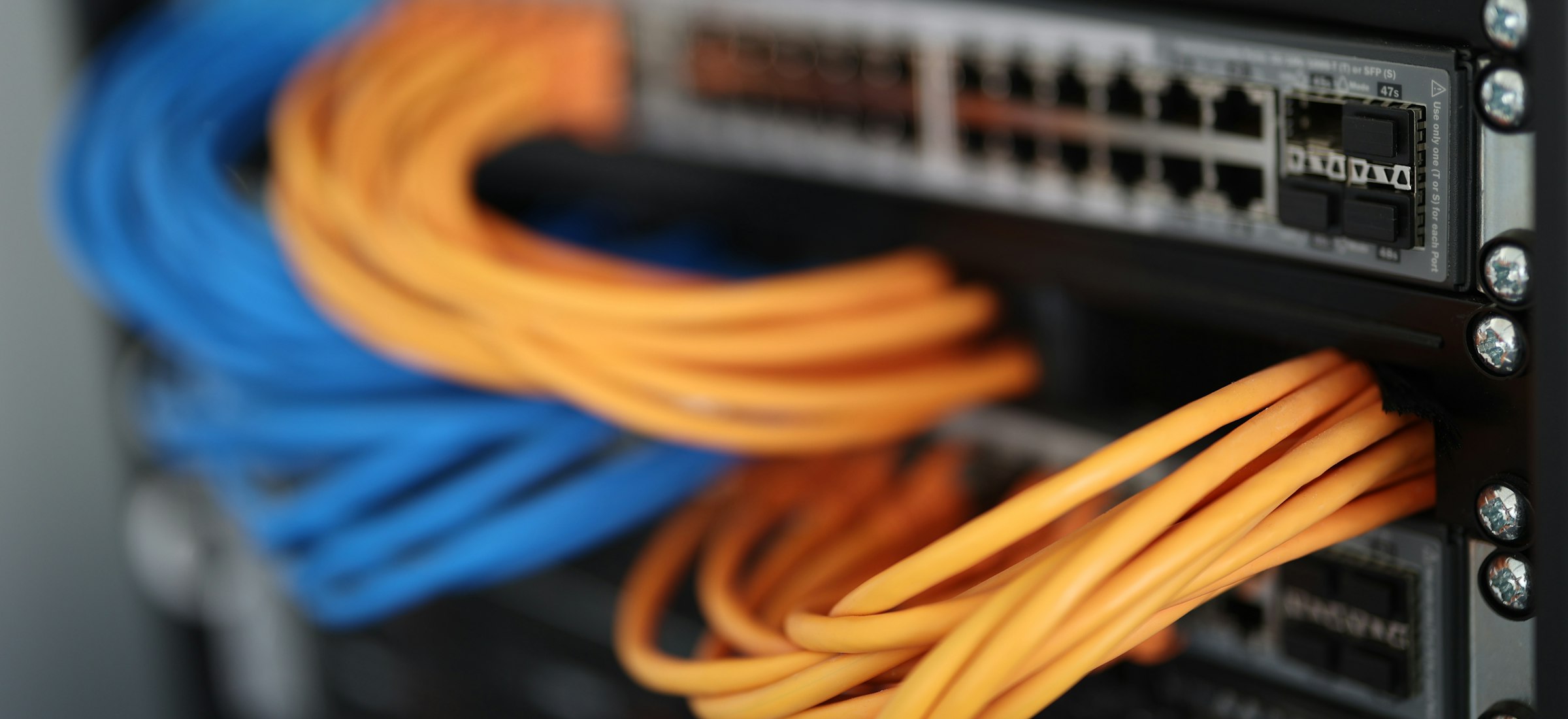 Technician working on network equipment